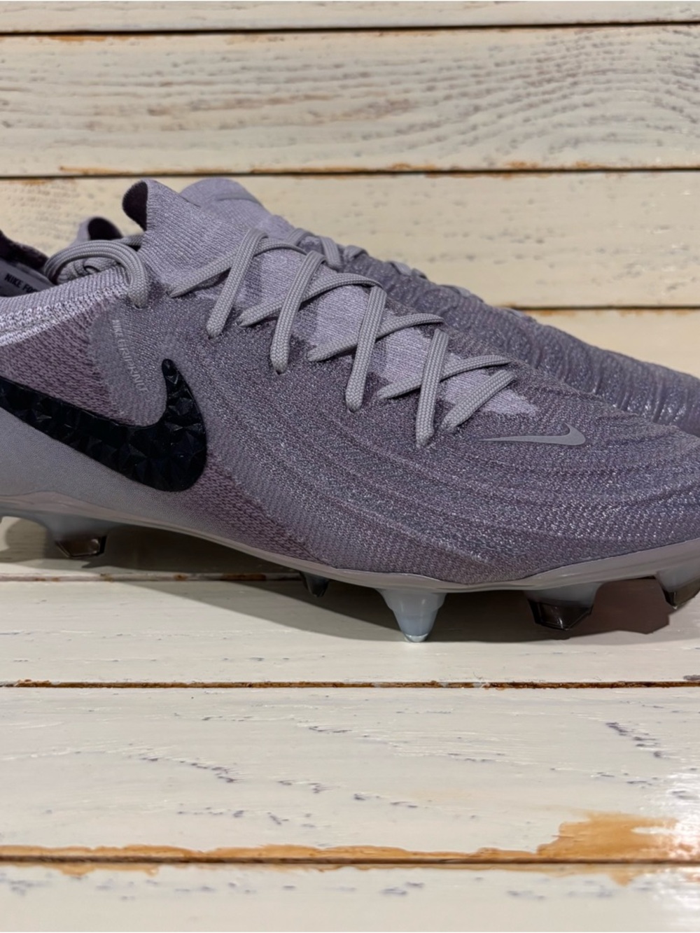 Nike Men’s Light Purple Football Cleats with Black Swoosh